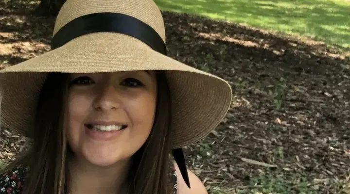 Picture Of Laura Sitting Down In Park